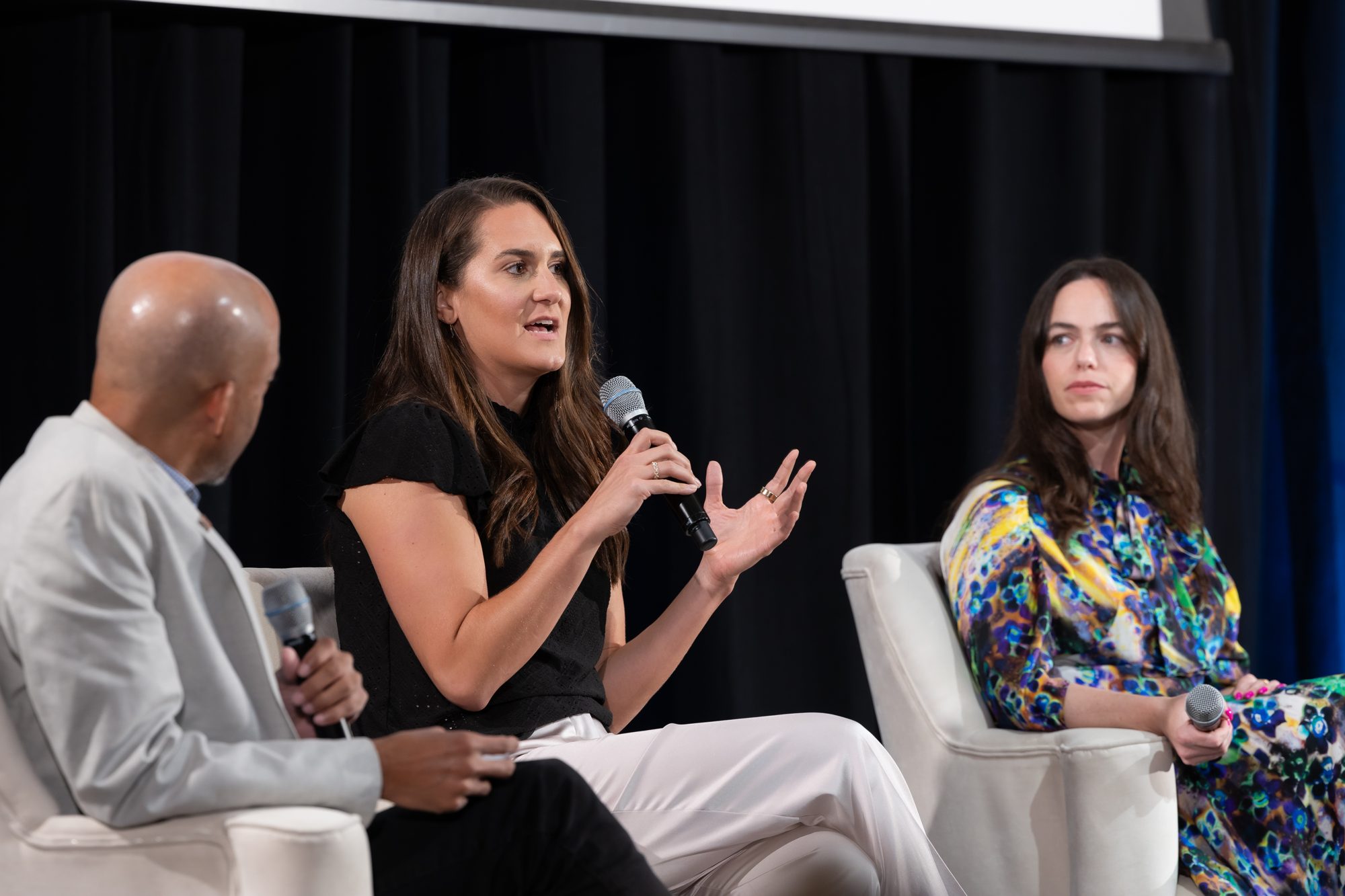 Panelists in conversation on stage at the Innovate@UCLA awards dinner